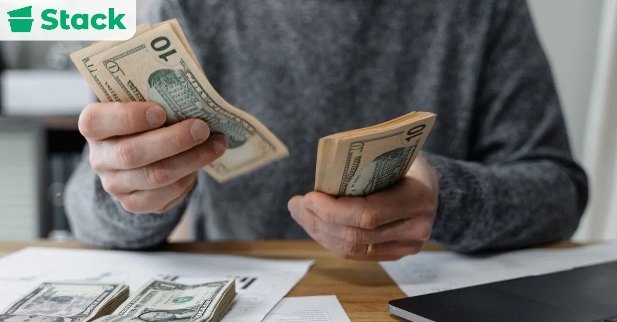Image showing organized moving boxes and plastic bins inside a home, representing affordable and convenient packing options for a move.